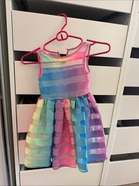 Rainbow dress with a button at the back